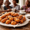 Golden plaited South African koeksister syrup-soaked sweet treat on a plate