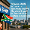 Inside a busy South African shop in Auckland filled with authentic foods and cultural products