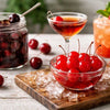 Diagram illustrating the evolution of maraschino cherry production methods