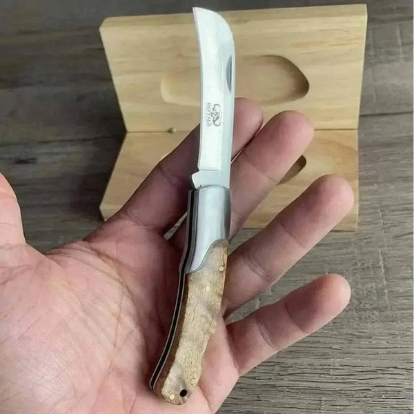 Buffalo River Biltong Tjom Knife with sharp curved stainless steel blade and sturdy laminate wood handle for slicing biltong