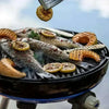 Portable CADAC Carri Chef 50 BBQ with dome lid, stainless steel burner, and 46cm cooking surface for versatile outdoor cooking