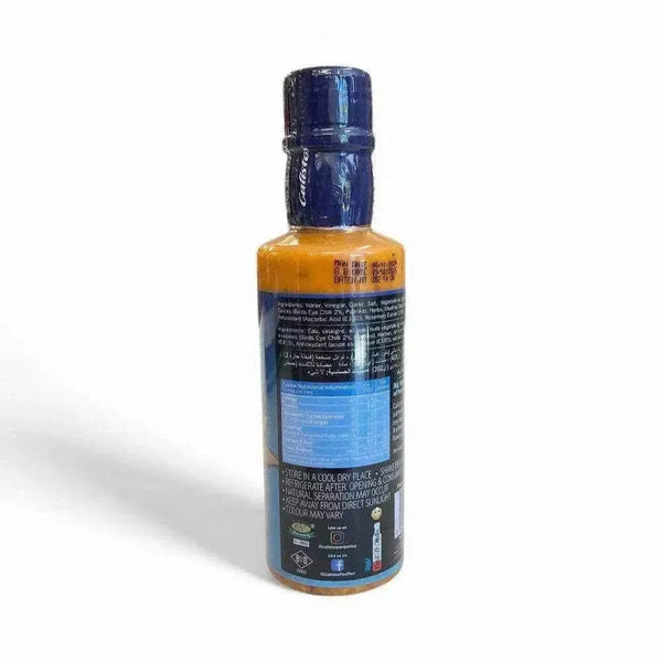 Calisto's Peri Peri Sauce Mild 250ml bottle with label showing ingredients and usage suggestions