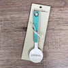 Enamel sugar spoon with wooden handle and laser engraved birds on a wire design