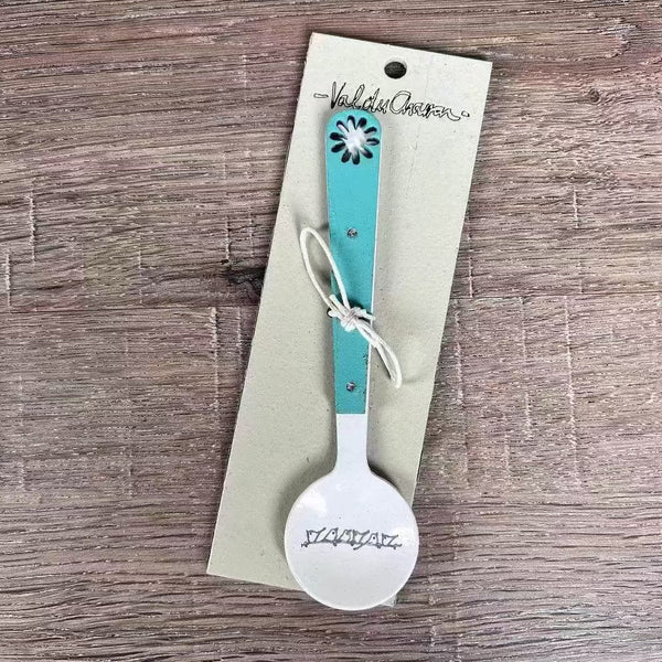 Enamel sugar spoon with wooden handle and laser engraved birds on a wire design