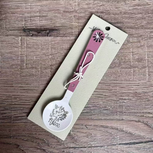 Enamel sugar spoon with wooden handle and laser engraved Fijnbos flower design