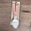 Enamel teaspoon set with wooden handles and laser engraved birds on a wire design
