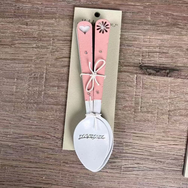 Enamel teaspoon set with wooden handles and laser engraved birds on a wire design