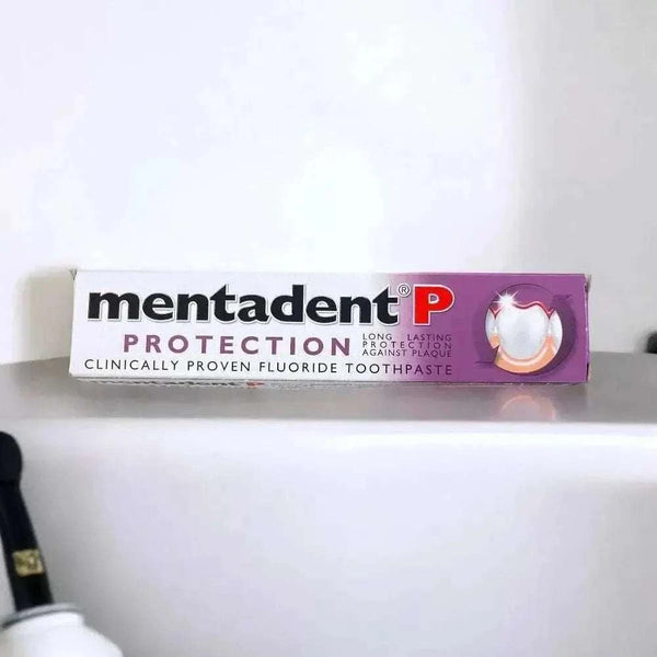 Mentadent P Toothpaste 100ml tube showing fluoride formula for cavity and plaque protection