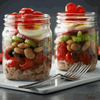 PEPPADEWS mild whole peppers in sweet and sour brine served in a jar salad with beans and vegetables