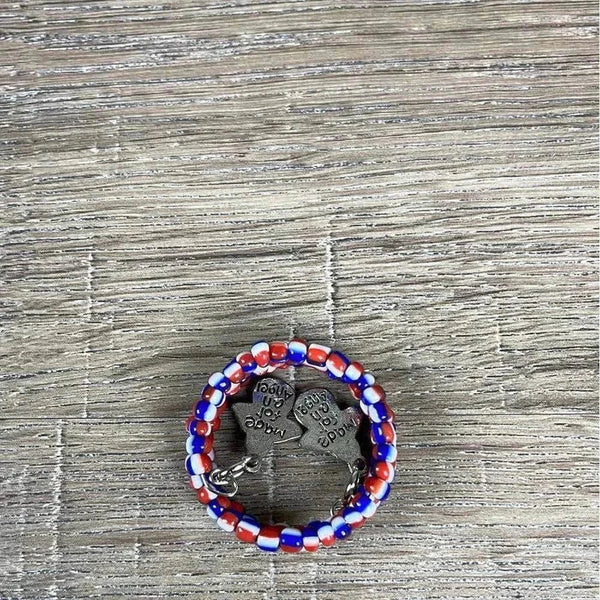 Blue, red, and white beaded serviette rings in a 6 pack, made with love