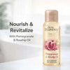 Oh So Heavenly Creme Oil dry body oil bottle with pomegranate and rosehip ingredients for nourishing skin