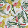 Beige tablecloth with pink and mustard tropical flower design for elegant dining setting