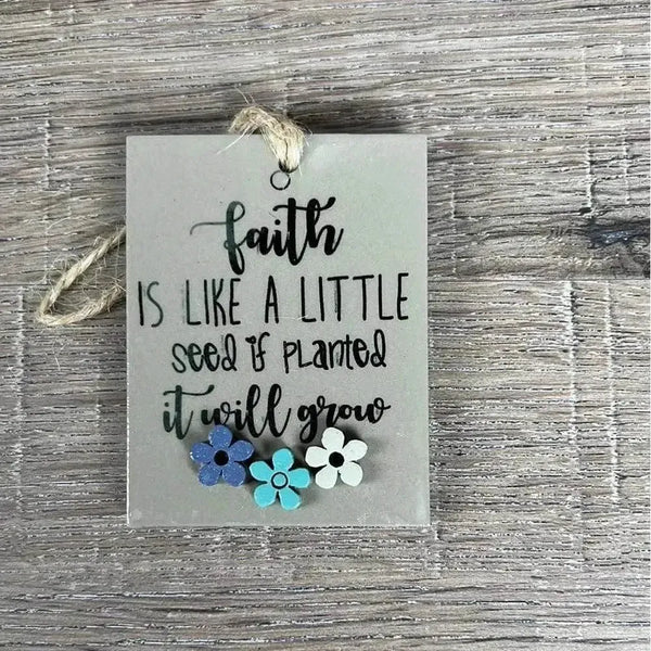 Wooden gift tag with faith quote and seed illustration