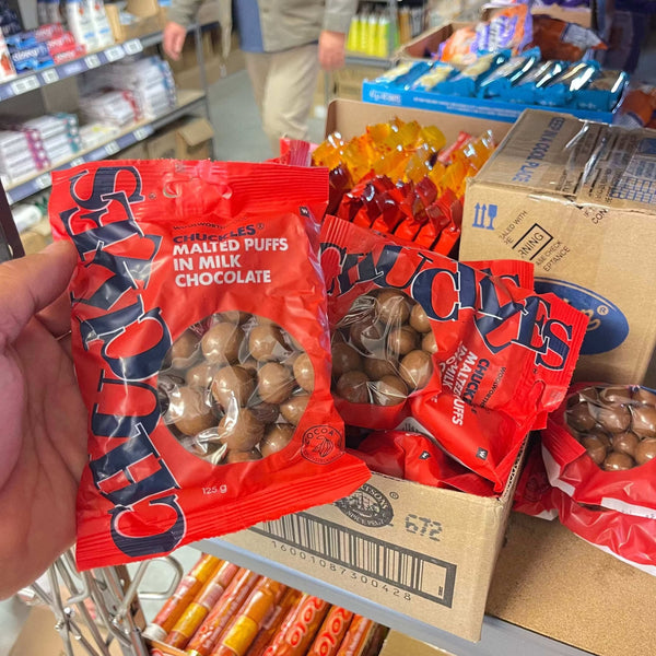 Woolworths CHUCKLES® Malted Puffs milk chocolate 125g pack with malted honeycomb spheres