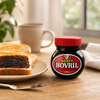 Beefy Bovril 125g jar with Bovril spread on toast