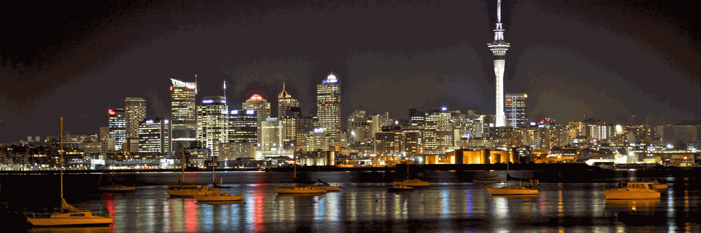 Auckland city skyline highlighting high housing costs and living expenses related to the cost of living in Auckland