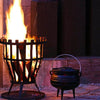 Cast iron potjie pot being seasoned and cared for with oil and heat
