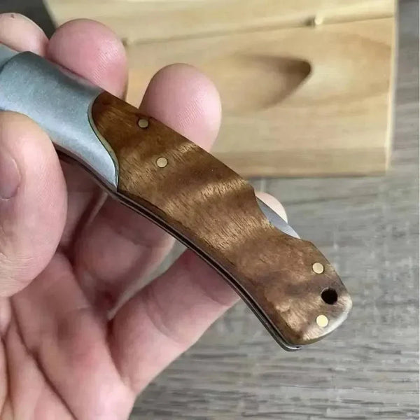 Buffalo River Biltong Tjom Knife with sharp curved stainless steel blade and sturdy laminate wood handle for slicing biltong