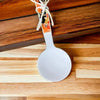 Enamel printed sugar spoon with wooden handle and Be You Tiful design