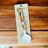 Enamel printed sugar spoon with wooden handle and Be You Tiful design