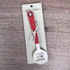 Enamel sugar spoon with wooden handle and laser engraved "Suikerbos Ek Wil Jou He" flower design