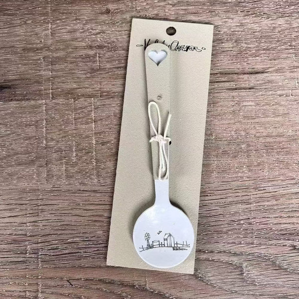 Enamel sugar spoon with wooden handle and farmhouse heart engraving