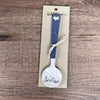 Enamel sugar spoon with wooden handle and farmhouse heart engraving