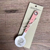 Enamel sugar spoon with wooden handle and laser engraved Fijnbos flower design