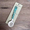 Enamel sugar spoon with laser engraved Fijnbos flower and wooden handle