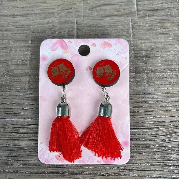 Hanging earrings with red circle and two birds design with red tassel, made in South Africa