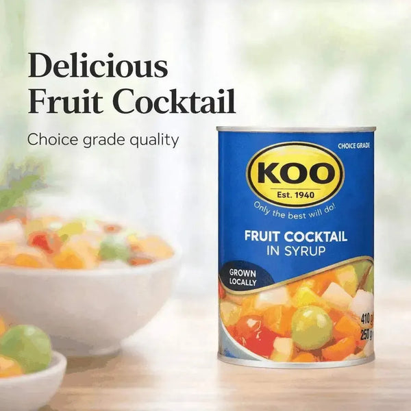 Koo Fruit Cocktail in Syrup 410g can with mixed cubed peaches, pears, grapes, pineapple, and cherries
