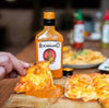 Bottle of Rooibaard Original Sauce 250ml for marinating and enhancing meat flavors