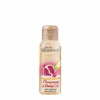 Oh So Heavenly Creme Oil dry body oil bottle with pomegranate and rosehip ingredients on white background