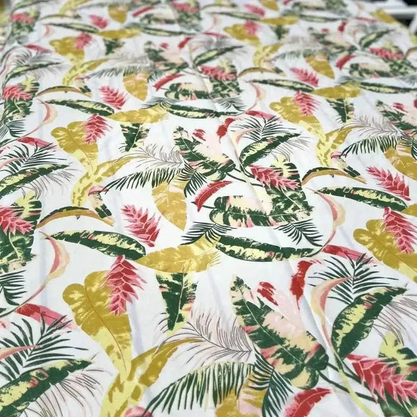 Beige tablecloth with pink and mustard tropical flowers for elegant dining