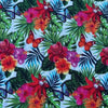 White tablecloth with tropical flower design on dining table