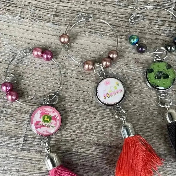 Set of 6 John Deere wine glass charms in assorted colors, each approx 1.5cm with 4cm rings